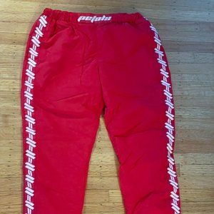 Petals and Peacocks Kindness Nylon Track Pants Red M